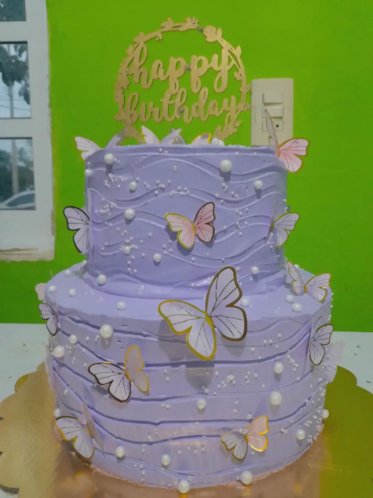 Pastel de Quinceañera morado con mariposas
