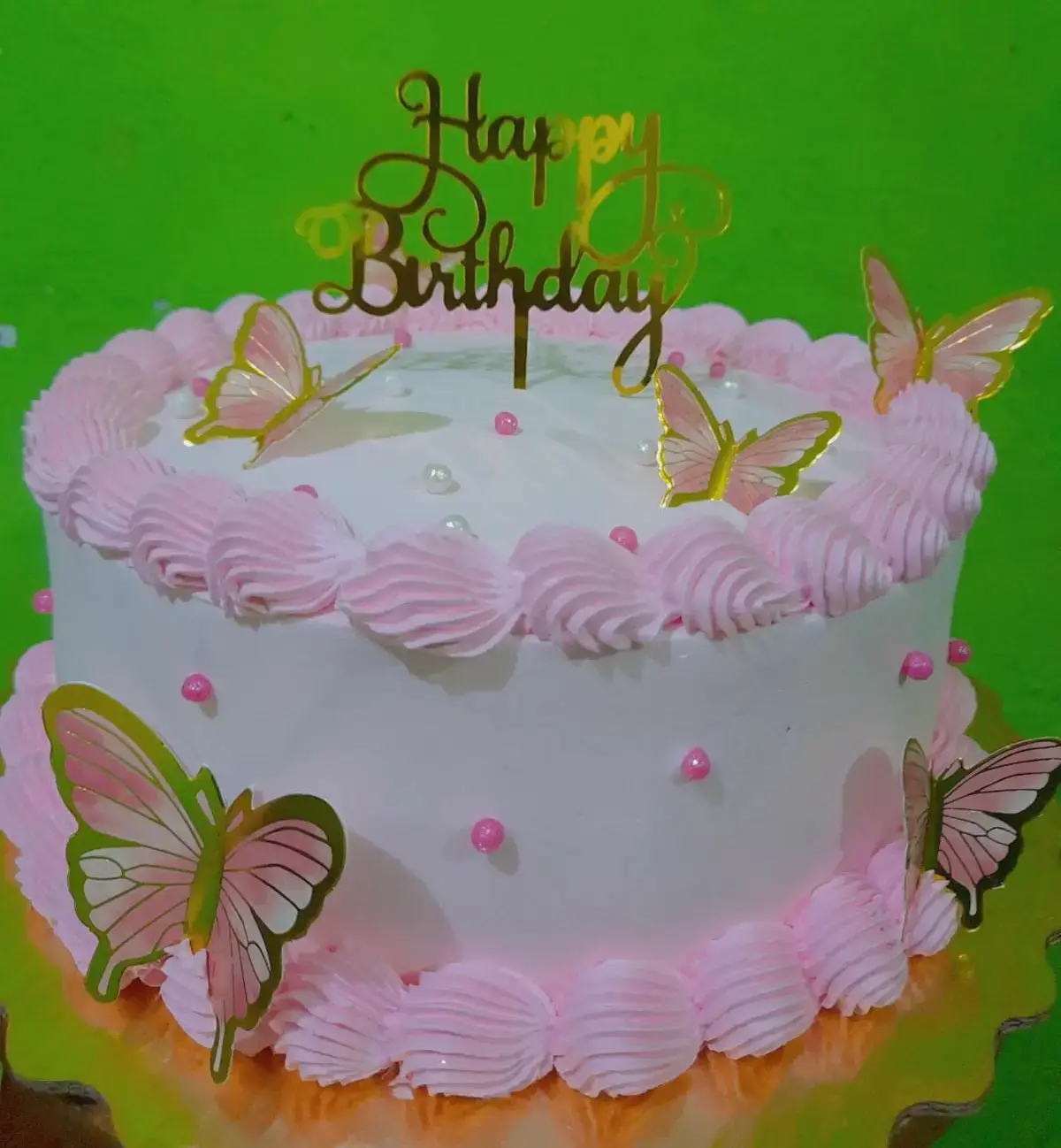 Pastel de Quinceañera rosa con mariposas